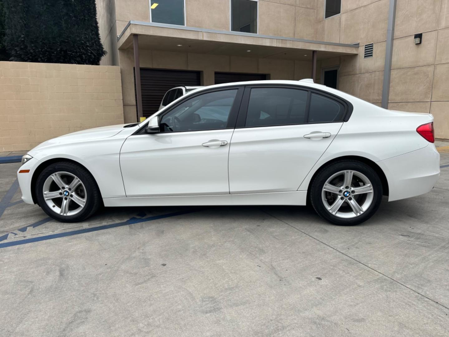 2013 White BMW 3-Series 328i Sedan (WBA3C1C52DF) with an 2.0L L4 DOHC 16V engine, AUTOMATIC transmission, located at 30 S. Berkeley Avenue, Pasadena, CA, 91107, (626) 248-7567, 34.145447, -118.109398 - Crown City Motors is a used “Buy Here Pay Here” car dealer in Pasadena CA. “Buy Here Pay Here” financing, means that when you purchase your vehicle from our dealership, that you make the payments to the dealership as well. We do not need the banks approval to get you approved for a used auto - Photo#3